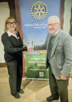 Maurice is congratulated by President Liz